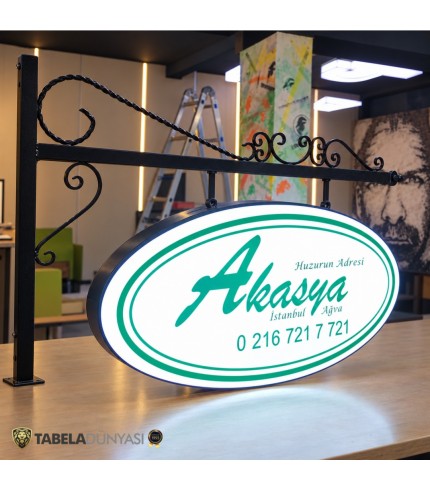 Akasya Ağva Ferforje Ayaklı Çift Taraflı Işıklı Elips Tabela